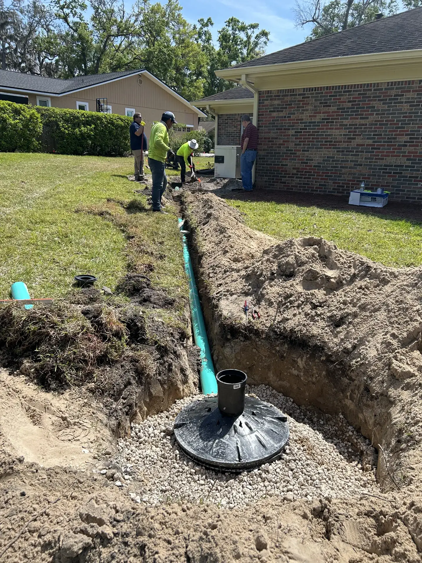 French drain and catch basin installed by Tampa Turf Services